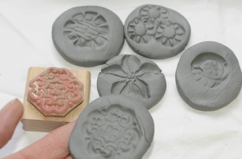 stamp the low fire clay for texture